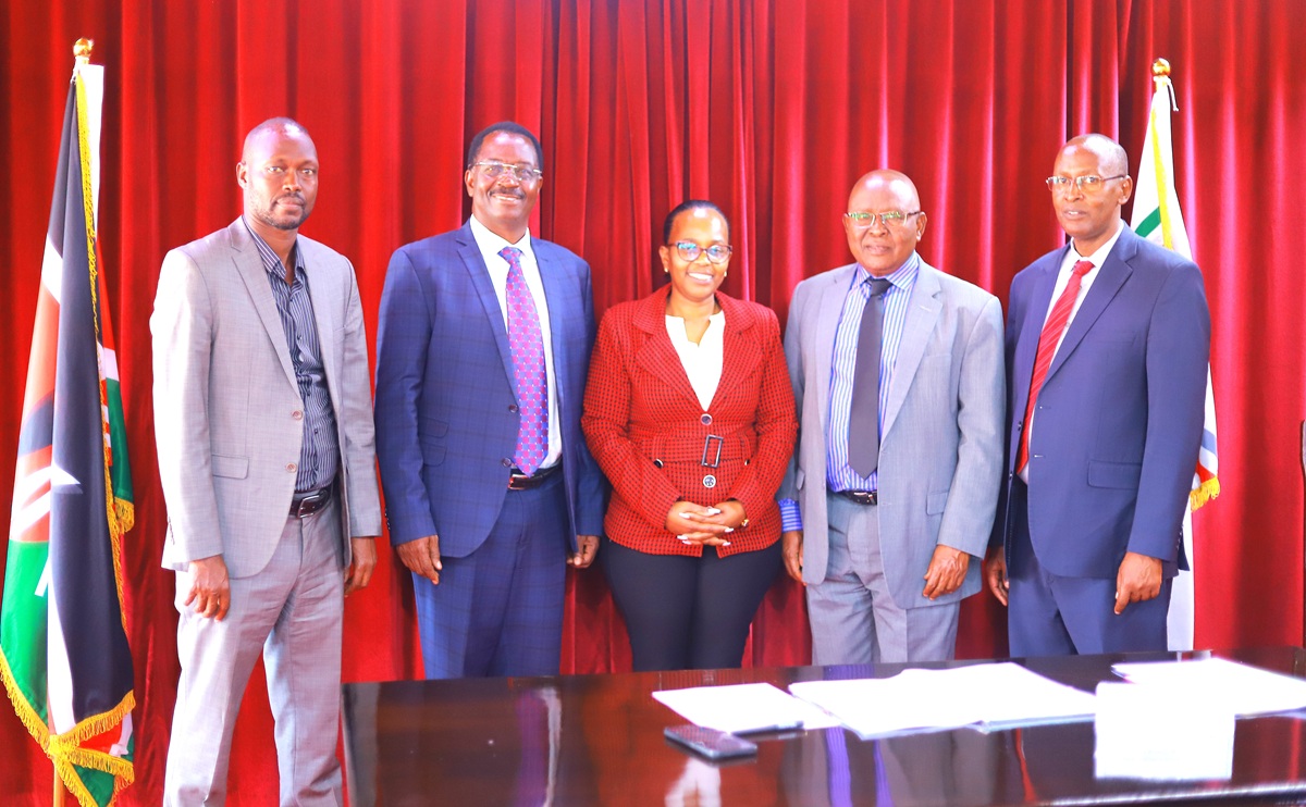 members-of-the-egerton-university-council-pose-for-a-group-photograph-with-newly-sworn-in-council-member
